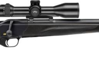 Side view of a sleek black rifle with a mounted scope, showcasing modern hunting equipment.