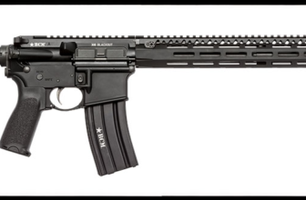 Black semi-automatic rifle with a tactical design, featuring a quad rail and detachable magazine.